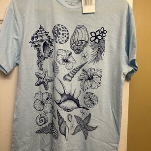 Light Blue Graphic T-Shirt with Seashell Design